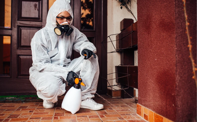 Exterminator treating residential area